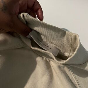 Essentials Cream Turtleneck Sweater with Ribbed Cuffs